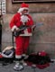 Santa Claus playing a guitar